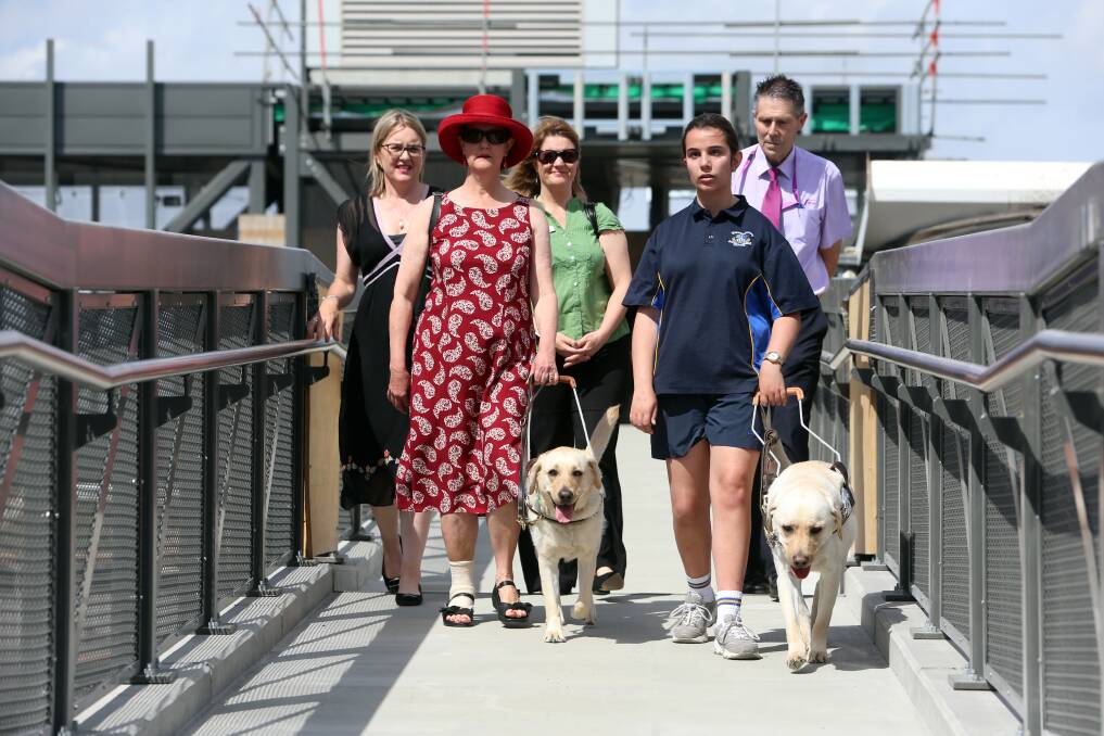 Bendigo East MP Jacinta Allen, Suzanne Gould, Guide Dogs Victoria's Sophie Wild, Ella Edwards and V/Line's area service manager Greg Christie at the new overpass. Picture: GLENN DANIELS 