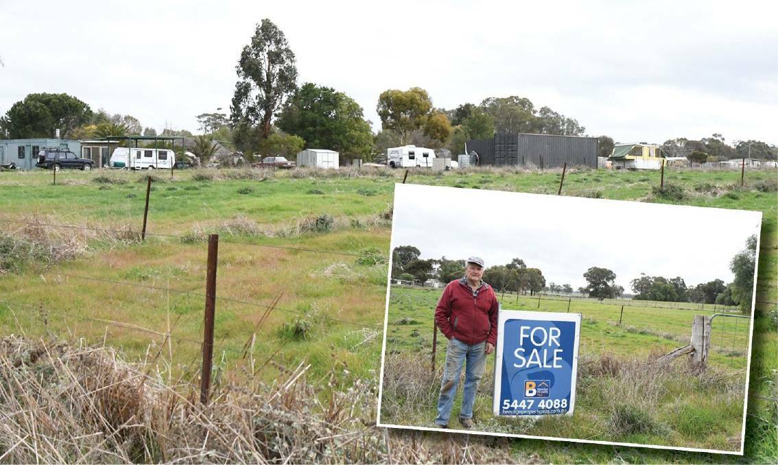 FOR SALE: Ken O'Shea pictured next to a number of vacant urban blocks for sale in Newbridge. A lack of town water or sewerage is inhibiting growth.