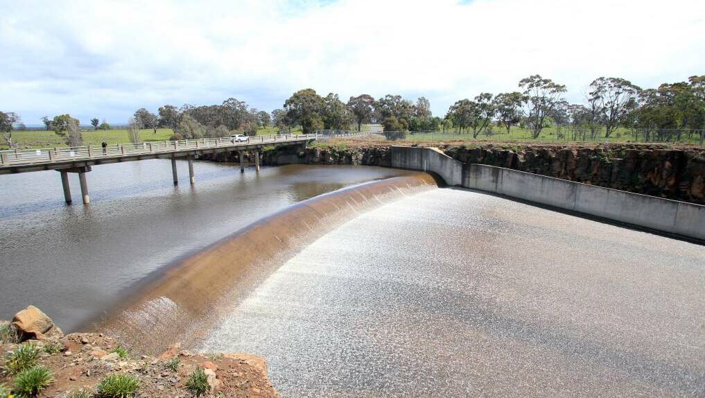 Water flows over the spillway at Lake Eppalock in early October 2016 - the first time in four years. Picture: GLENN DANIELS