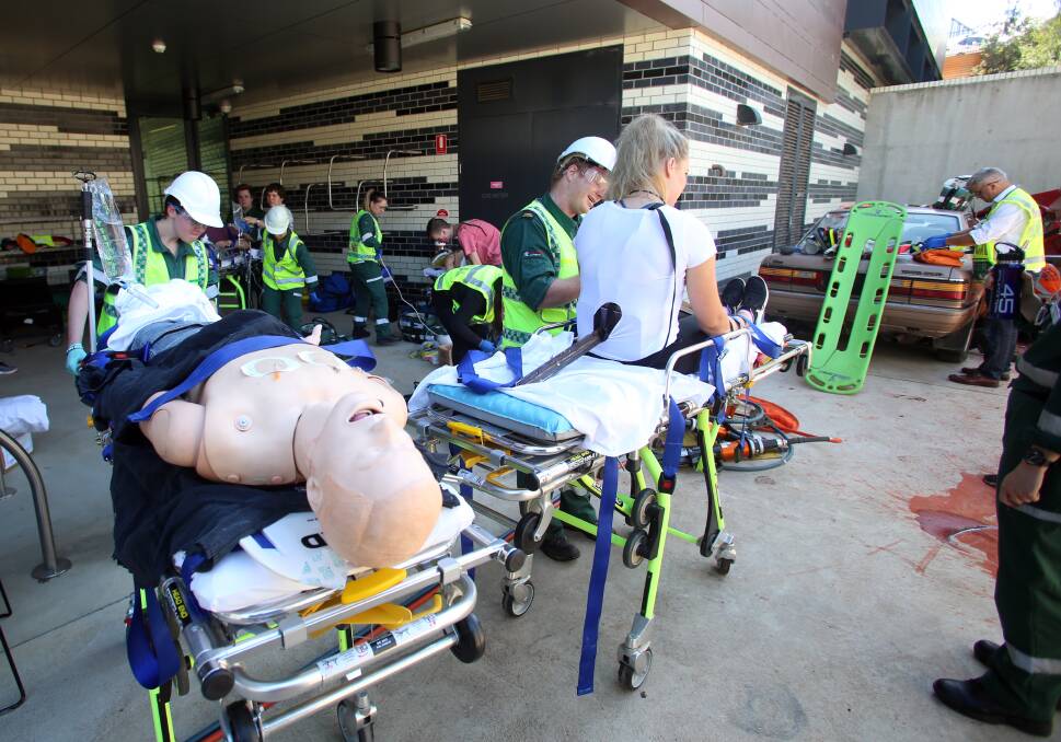 HUB PLANS: La Trobe University plans to use existing expertise at its Bendigo campus, including paramedicine, to create a road trauma research hub. Paramedicine students are pictured during a mock emergency in 2017.