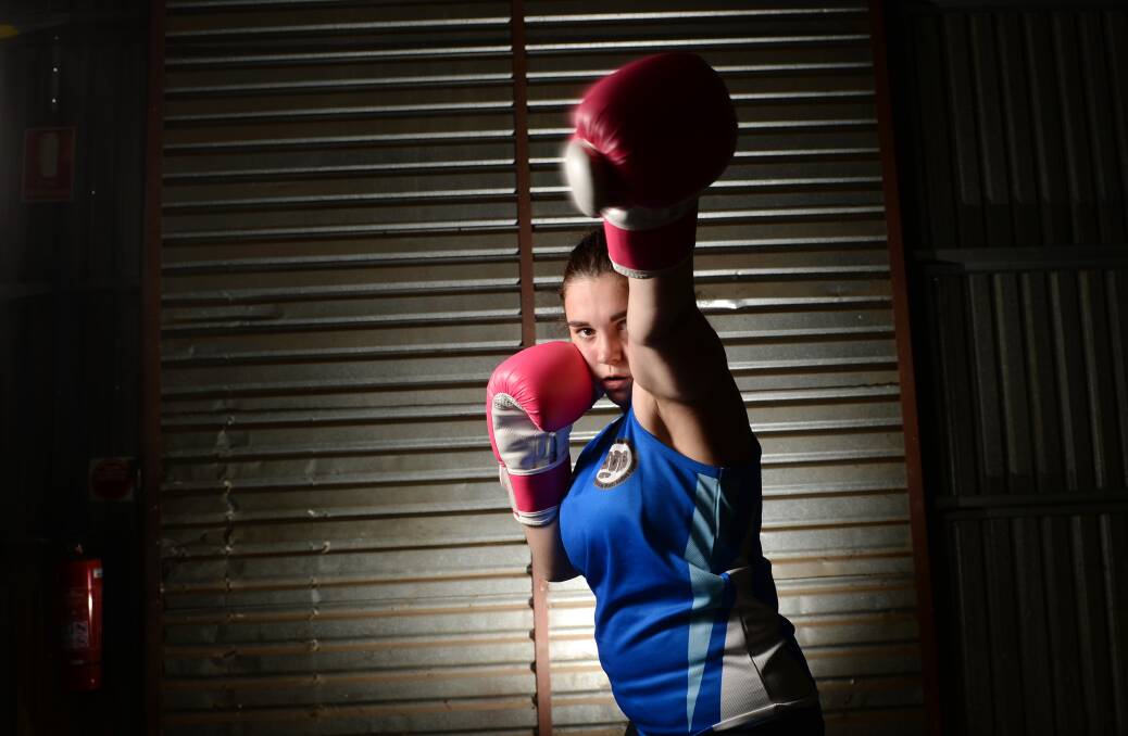 LEFT JAB: Charlotte Daley said the Blue Light boxing program has given her confidence. Picture: DARREN HOWE.
