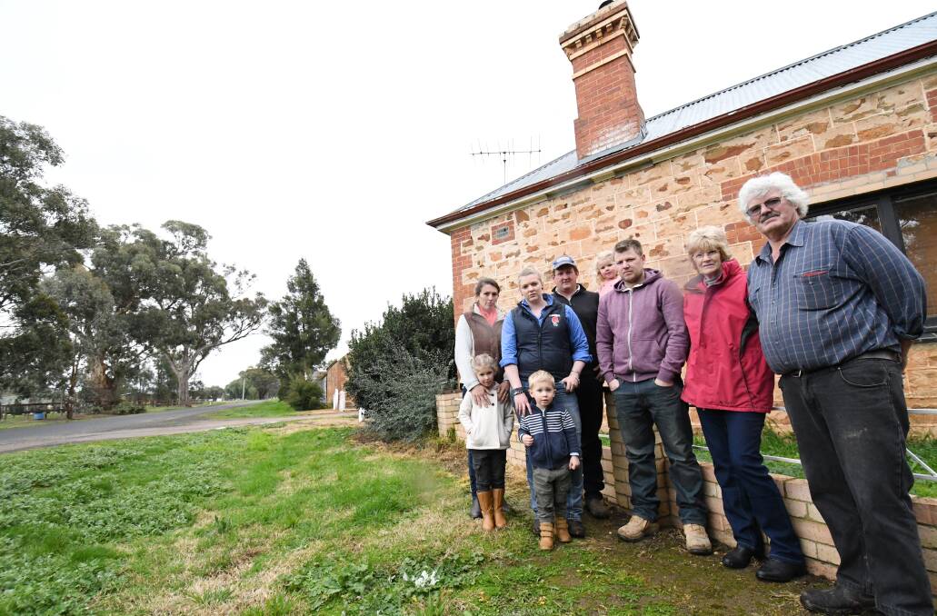 NO DEAL: Max Carter (far right) said the offer from the City of Greater Bendigo to buy their land was inadequate. Picture: DARREN HOWE