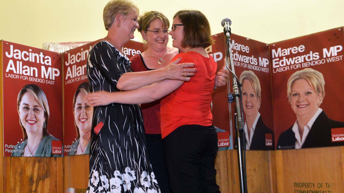 From left; state Labor members Maree Edwards and Jacinta Allan and federal Labor MP Lisa Chesters celebrate after the 2014 state election.