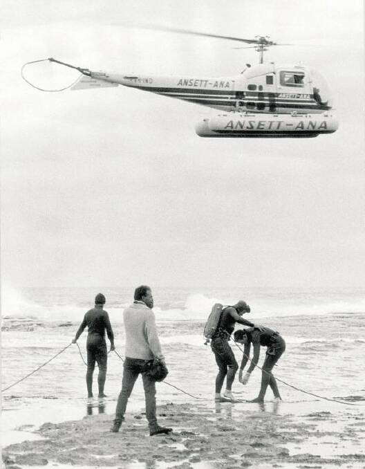 Navy skin divers prepare to enter the ocean at Cheviot Beach, Monday 18 December 1967. - Death of Prime Minister Harold Holt, while swimming in surf near Portsea.