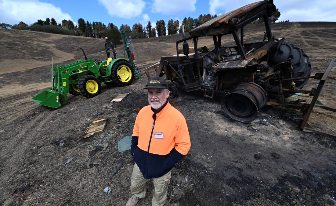 Blaze Aid Buangor camp coordinator Graeme Allen with one of two new tractors donated to the organisation from Ballarat-based farm machinery company Brandt. Picture by Lachlan Bence
