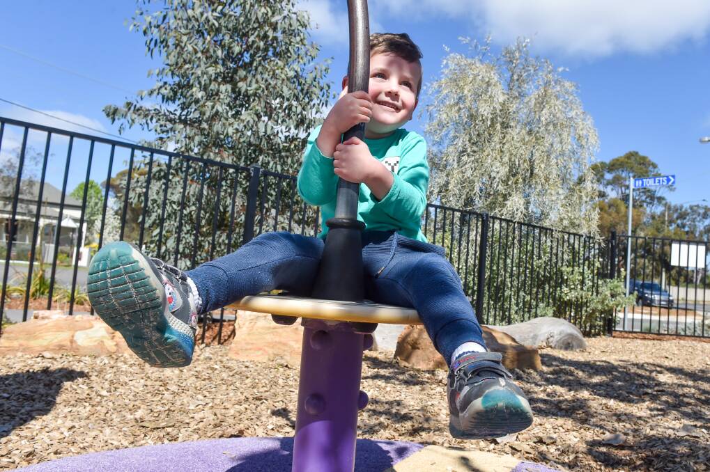 FUN: James Lothian was happy to be back at Eaglehawk playspace, one of many that reopened on Monday. Picture: DARREN HOWE 