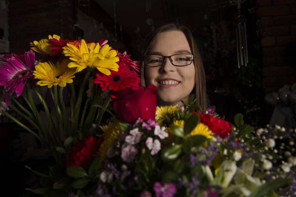 IN BLOOM: Eaglehawk Floral Boutique's Morgan Evely is ready to prepare hampers, bouquets and deliveries for Mother's Day on Sunday. Picture: DARREN HOWE