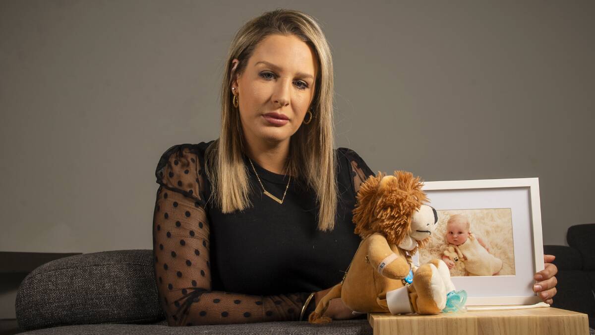 FOREVER LOVED: Amie Goodwin and a photograph of her son Romeo, who passed away in October 2019. Picture: DARREN HOWE