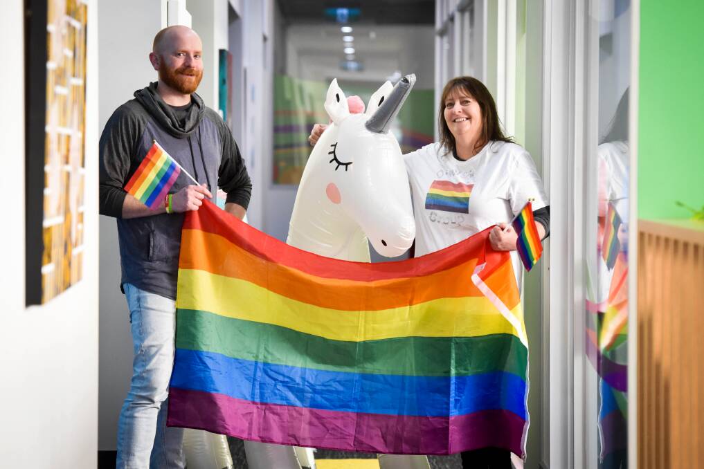 RAINBOWS AND UNICORNS: headspace Bendigo centre manager Lindsay Rose and HEY Diversity worker Maree Dixon with Cina the unicorn. Picture: BRENDAN MCCARTHY 