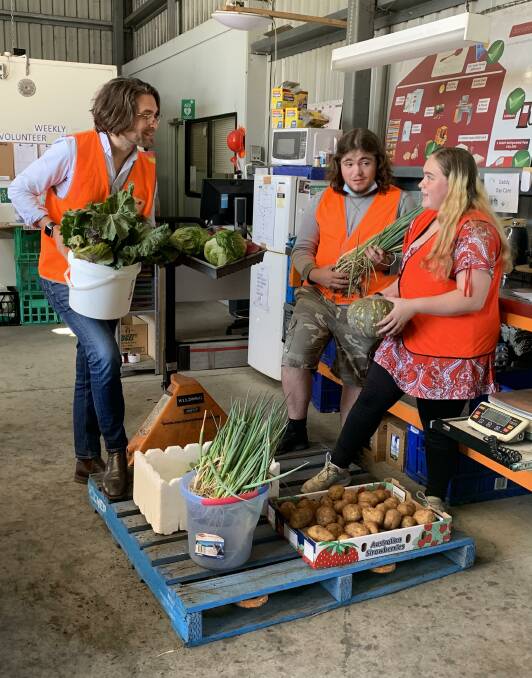 KNOWLEDGE: VicHealth chief executive Sandro Demaio with students from Kalianna Special School, who have been part of a food skills program facilitated by Bendigo Foodshare. Picture: NICHOLAS NAKOS