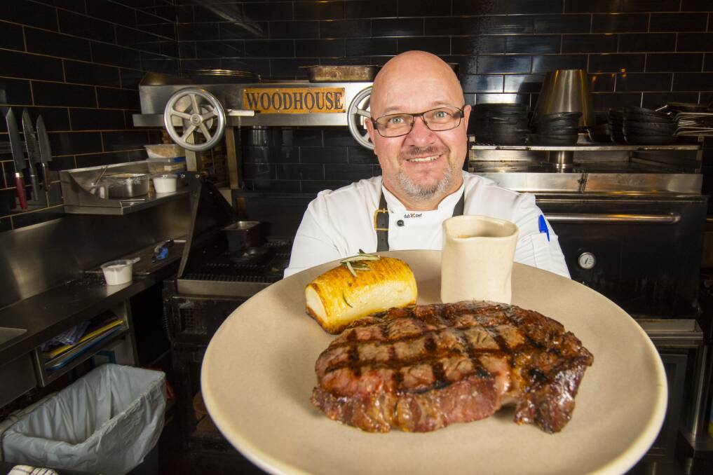The Woodhouse's Paul Pitcher with a Cohuna Wagyu scotch fillet, well before COVID-19. Picture: DARREN HOWE