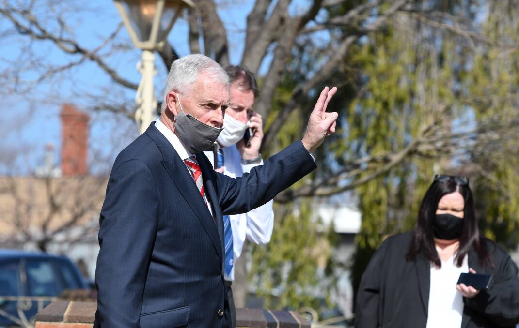 GOING, GOING, GONE: Tweed Sutherland First National principal Craig Tweed at the auction of 119 Queen Street, Bendigo on Friday. Picture: NONI HYETT. 