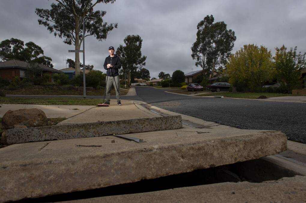 SOAKED: Bradley Carr spent his weekend cleaning up after drain lids flew off and flooded his property and it's not the first time, he said. Picture: DARREN HOWE