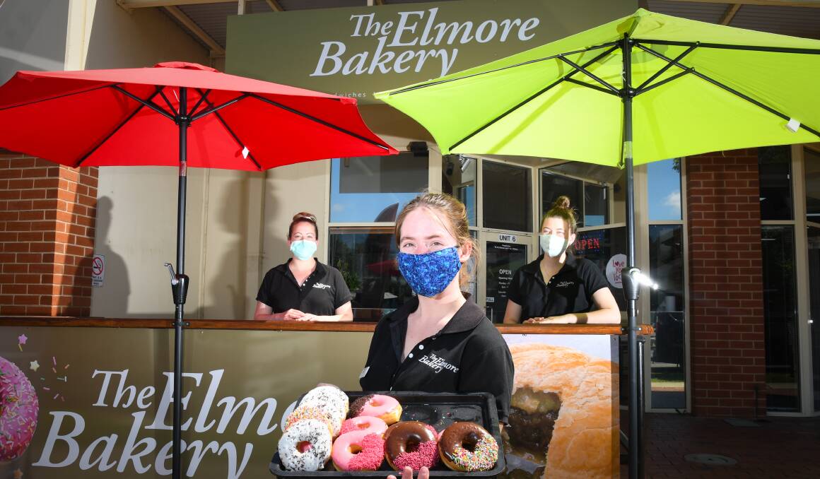 IRRESISTABLE: Staff at Elmore Bakery's Bendigo shop serving up delicious donuts, following their recent move from the grounds of the former Newmarket Hotel. Picture: NONI HYETT 