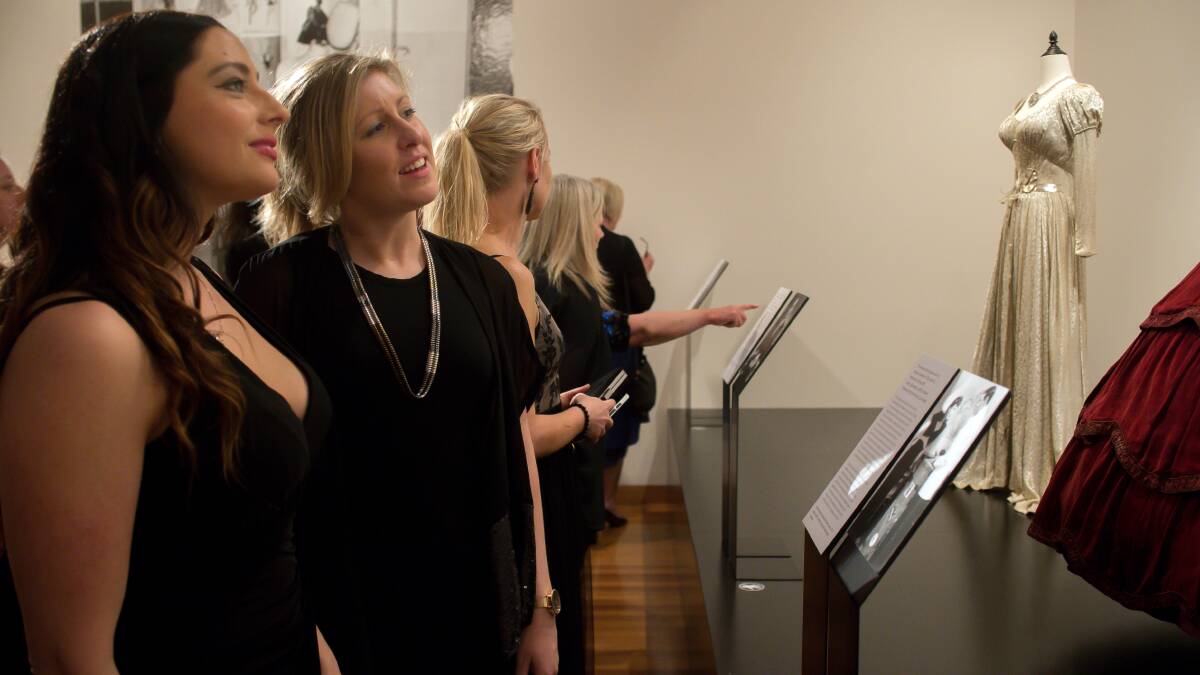 LOOK OF ADMIRATION: Visitors enjoying a Gallery event. Photo: Bill Conroy