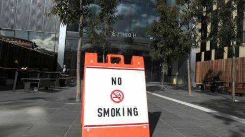 Smokers ignoring no-smoking signs