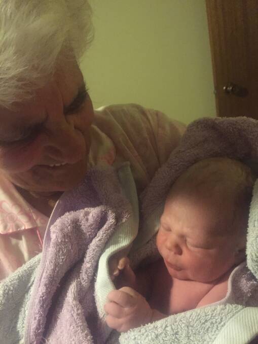 MISSION ACCOMPLISHED: Great-grandmother Dot Looker and baby Logan after his birth.