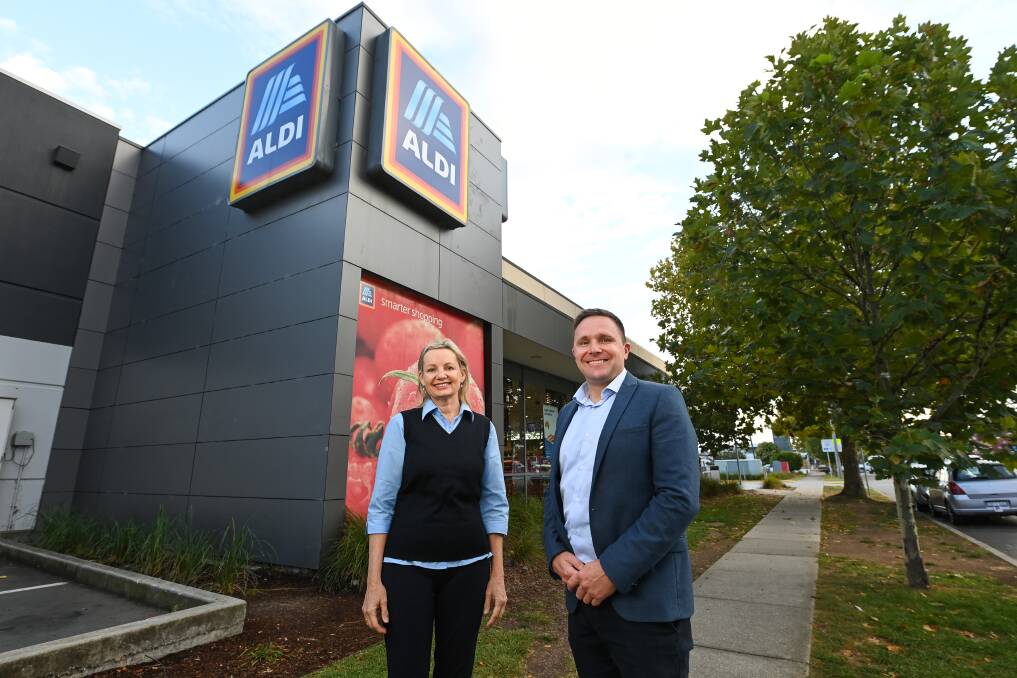 COMMITTED TO CAUSE: Federal environment minister Sussan Ley and ALDI's customer interactions director Adrian Christie outside the company's Young Street store in Albury.