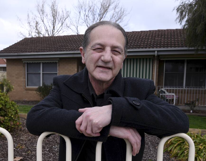 NEW HOME: 65-year-old Cliff Moxon is feeling positive about his future now he is living in a house. He sought help after running out of savings and spending three years living in a caravan. Pictures: Lachlan Bence 