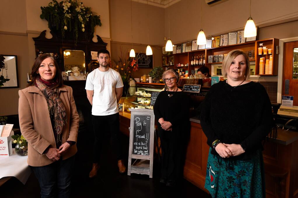 GIVING: WRISC Family Violence Support's Margaret Cooper, Skip's Jake Dunne, Turret Cafe owner Carmel West and Berry Street's Denise Sheridan are working together to Pay It Forward. Picture: Adam Trafford 