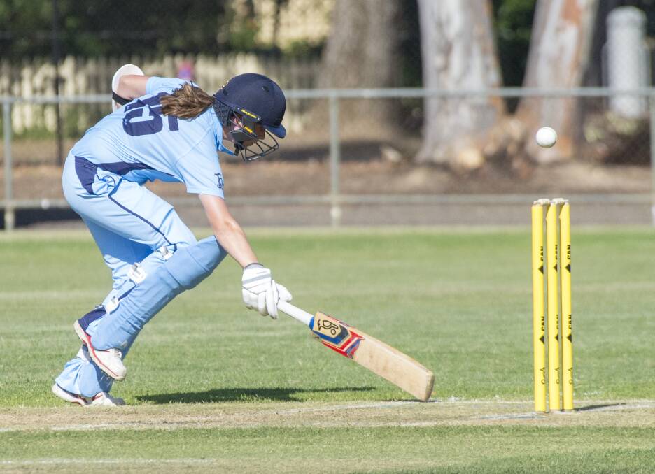 NSW Metro's Elise Noble makes her ground after taking a quick single against SA. Picture: DARREN HOWE