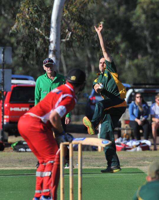 WICKET-TAKER: Brent Downie bowls for Emu Creek against Mandurang on Tuesday night. Pictures: ADAM BOURKE