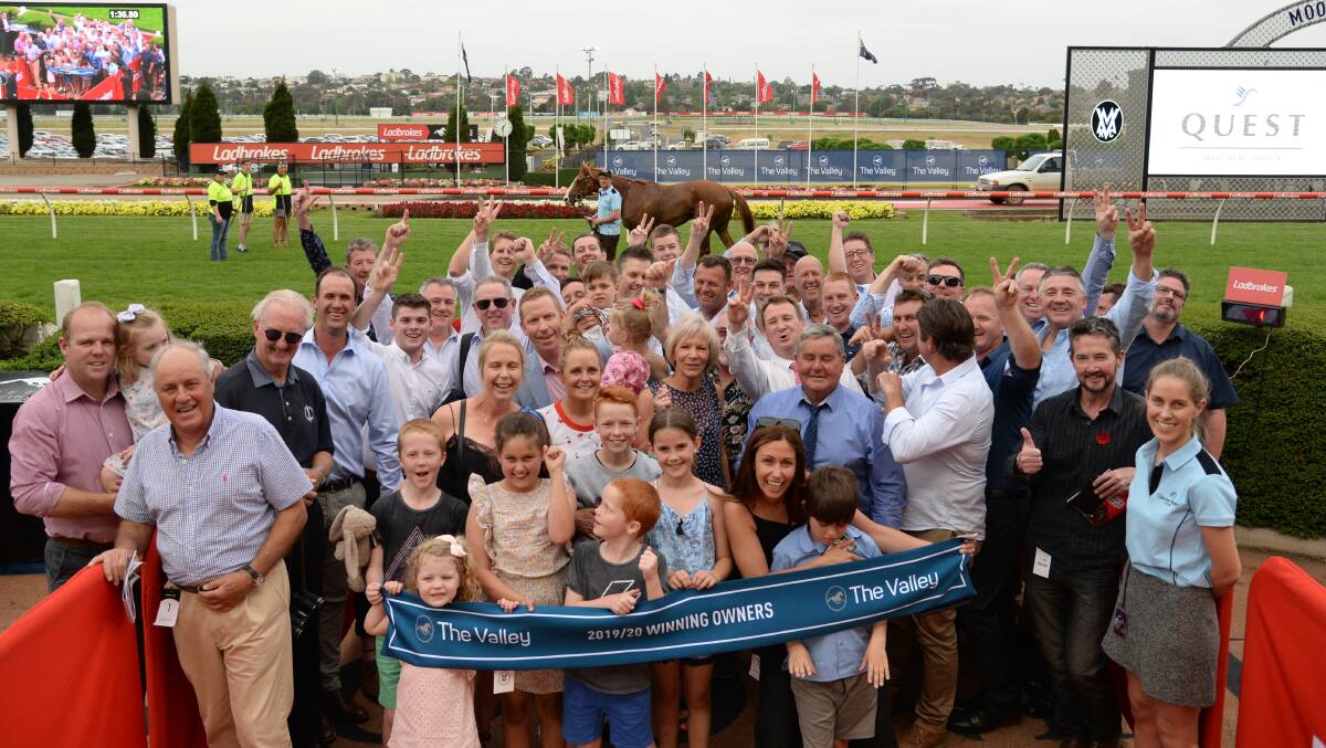 HAPPY DAYS: Heart of Puissance's owners celebrate the horse's win at Moonee Valley last spring. Picture: GETTY IMAGES