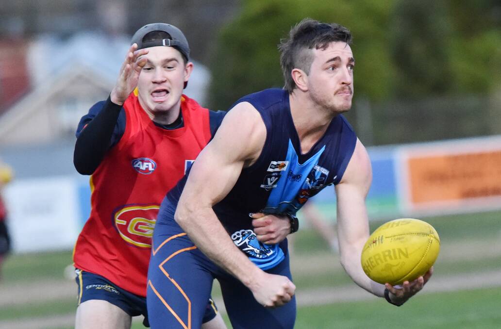 RUCK OR BACK?: Clayton Holmes has a major role to play for Eaglehawk on Saturday. Picture: DARREN HOWE