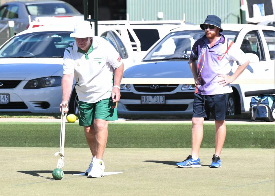 TALE OF TWO TEAMS: A confident Barry Anset bowls his final bowl of an end in front of a despondent Bendigo skipper Andrew Brown.