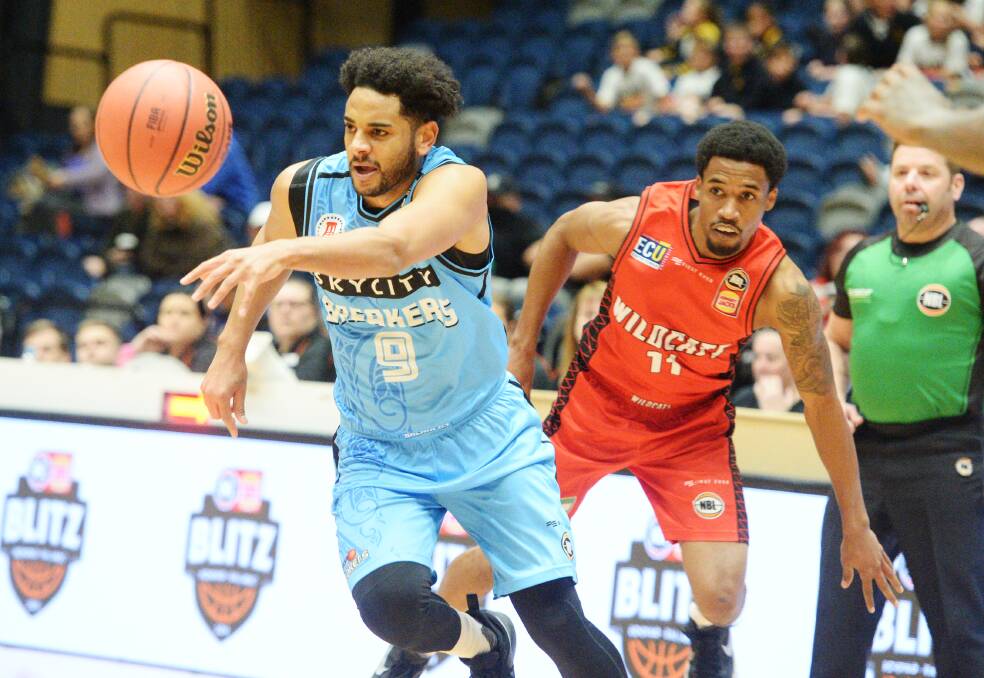 SWEET MOVE: New Zealand Breakers' guard Corey Webster gets past Perth guard Bryce Cotton on day one of the NBL Blitz in Bendigo. Pictures: DARREN HOWE