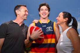 Adelaide Crows draftee Charlie Edwards with his proud parents Greg and Mandy. Picture by Darren Howe