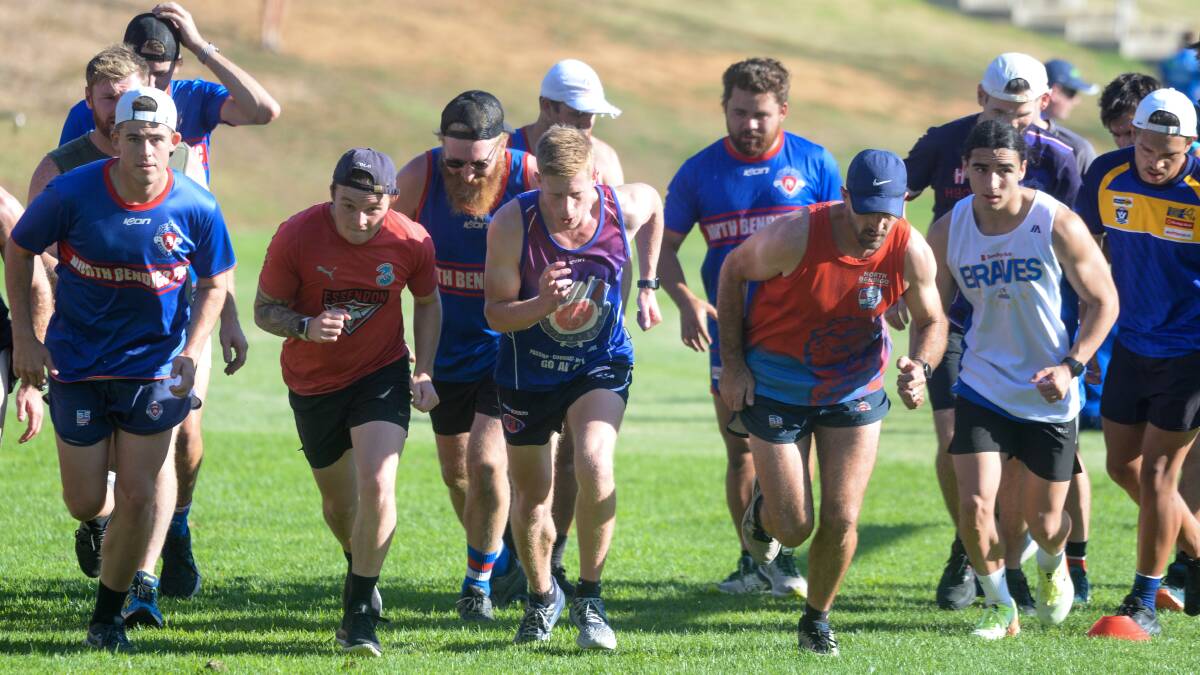 The Bulldogs on the training track on Wednesday night. Picture: DARREN HOWE