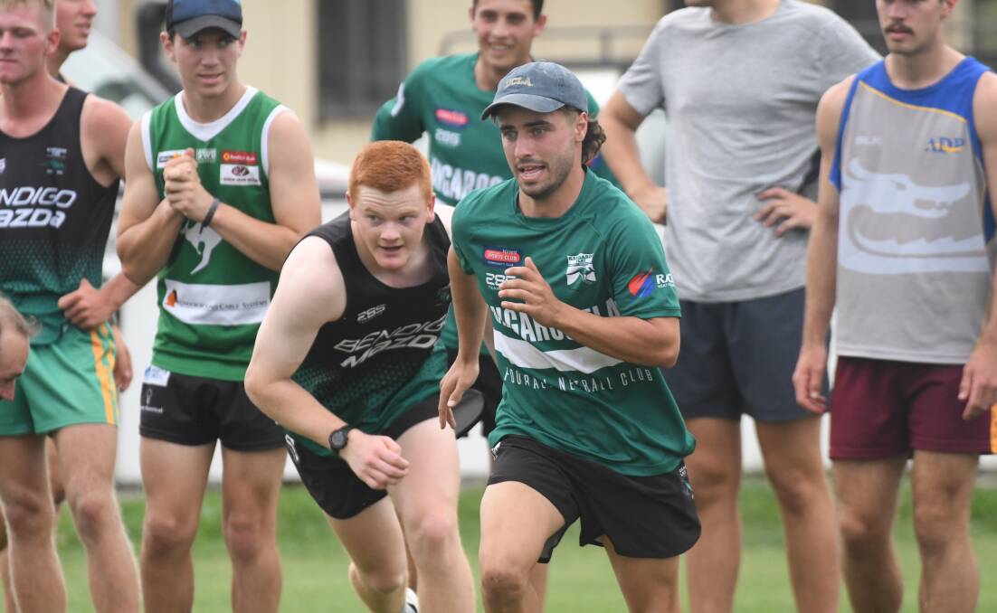 FAST-MITCH FIBRES: Mitch Rovers and Mitch Trewhella lead the way in a running drill at Kangaroo Flat training. Pictures: ADAM BOURKE