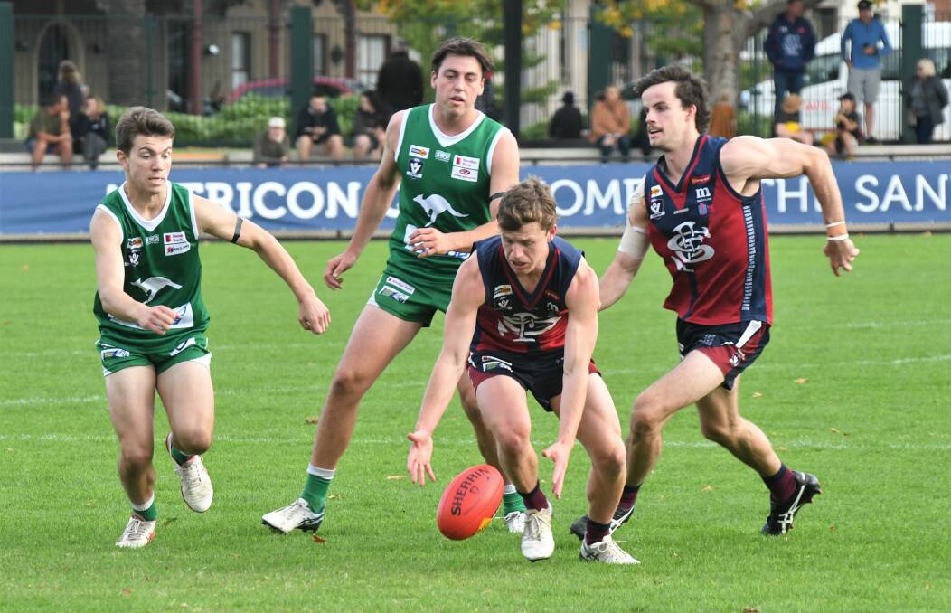 IN FRONT: Sandhurst forward Lachlan Zimmer leads the race for the ball in the Dragons' win over the Roos. Picture: ADAM BOURKE