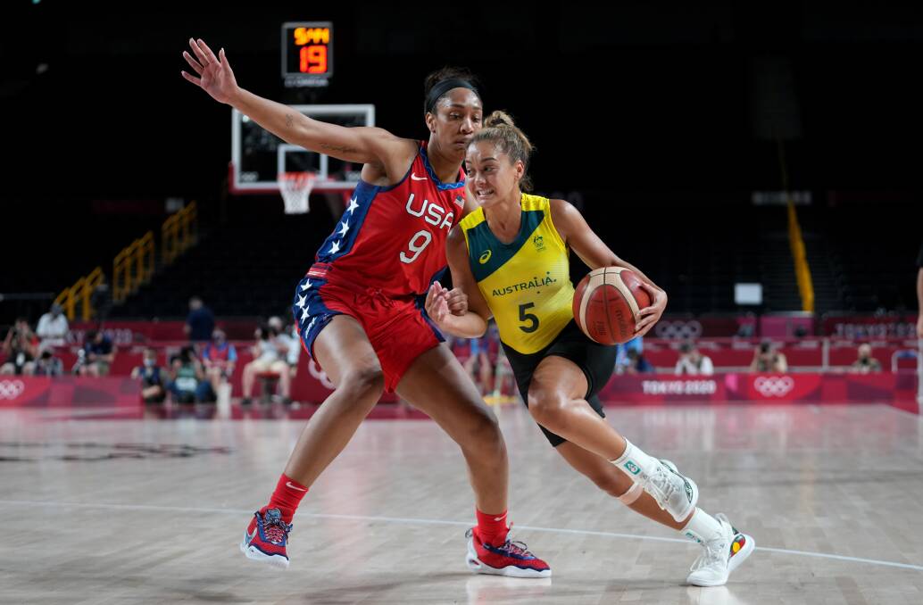 GALLANT: Leilani Mitchell drives to the basket against the USA. Picture: AAP
