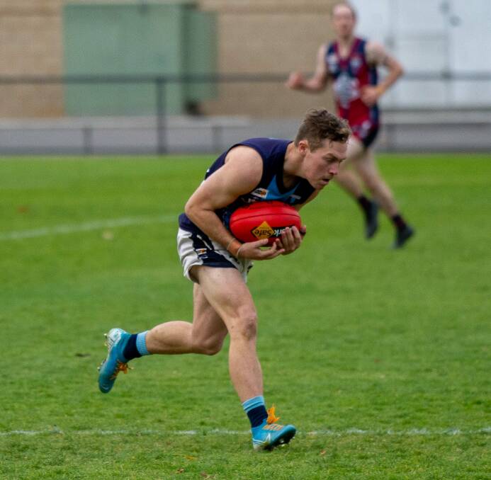 Riley Saunders marks for Eaglehawk in Saturday's loss to Sandhurst. Picture: PETER WEAVING