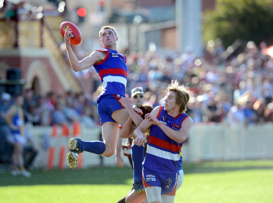 ATHLETIC: Anthony Belcher in the 2012 BFNL grand final. Picture: JIM ALDERSEY