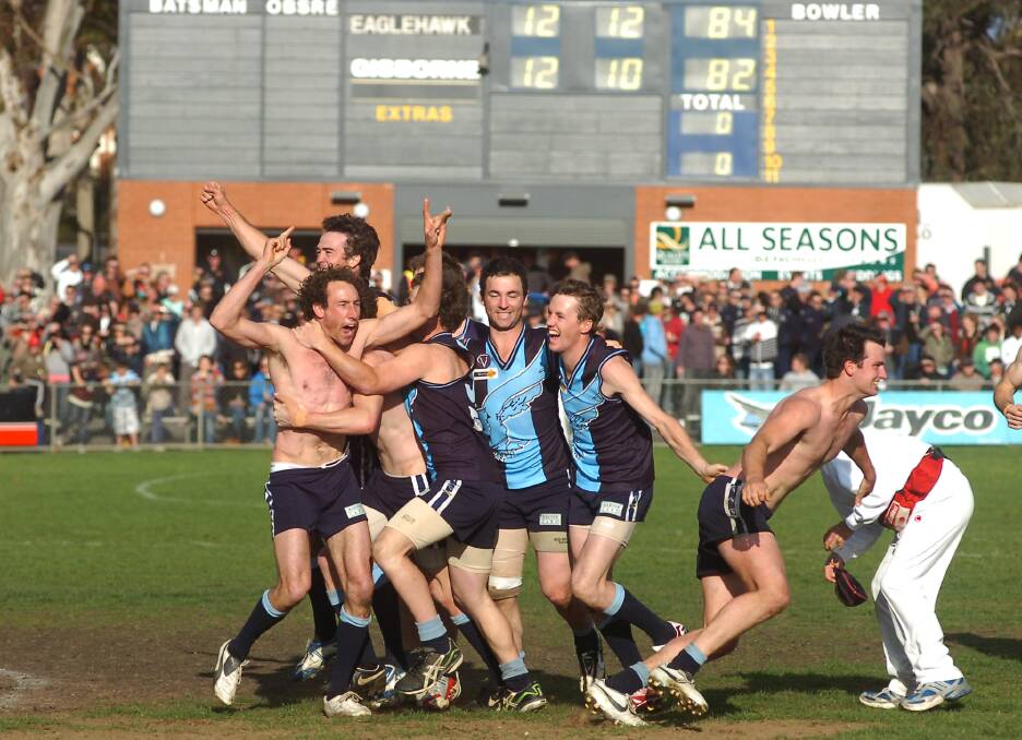 Eaglehawk players embrace after their thrilling two-point win over Gisborne in the 2007 grand final.
