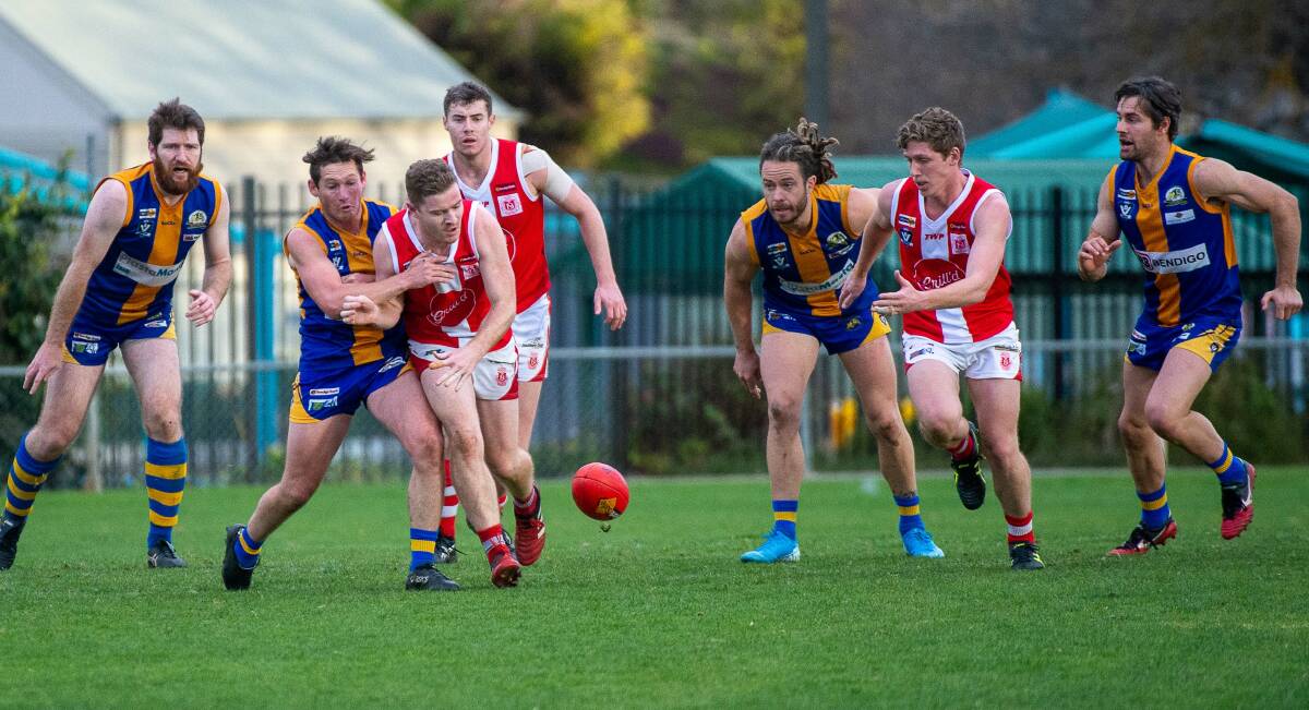 CONTESTED FOOTY: Golden Square and South Bendigo players battle for the ball at Wade Street.