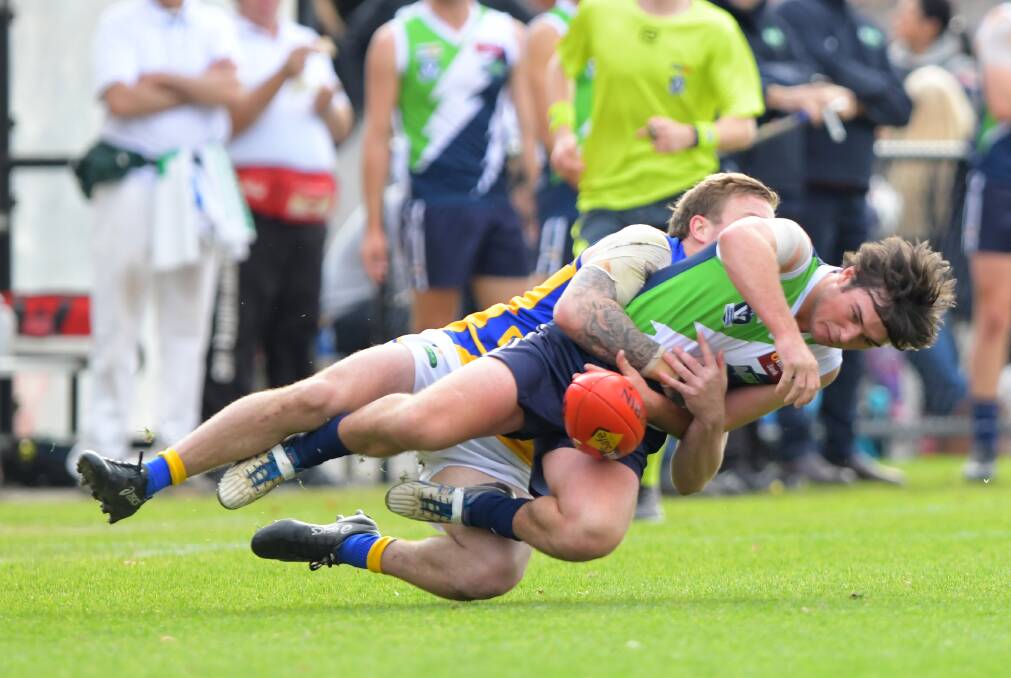 Loddon Valley's Kyle Chant is wrapped up in a big tackle against Golden Rivers. Picture: GLENN DANIELS