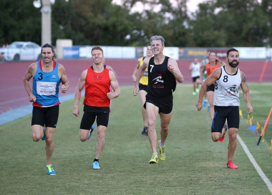 Arron Downes, far left, charges home to win the 800m Open final. Picture: GLENN DANIELS
