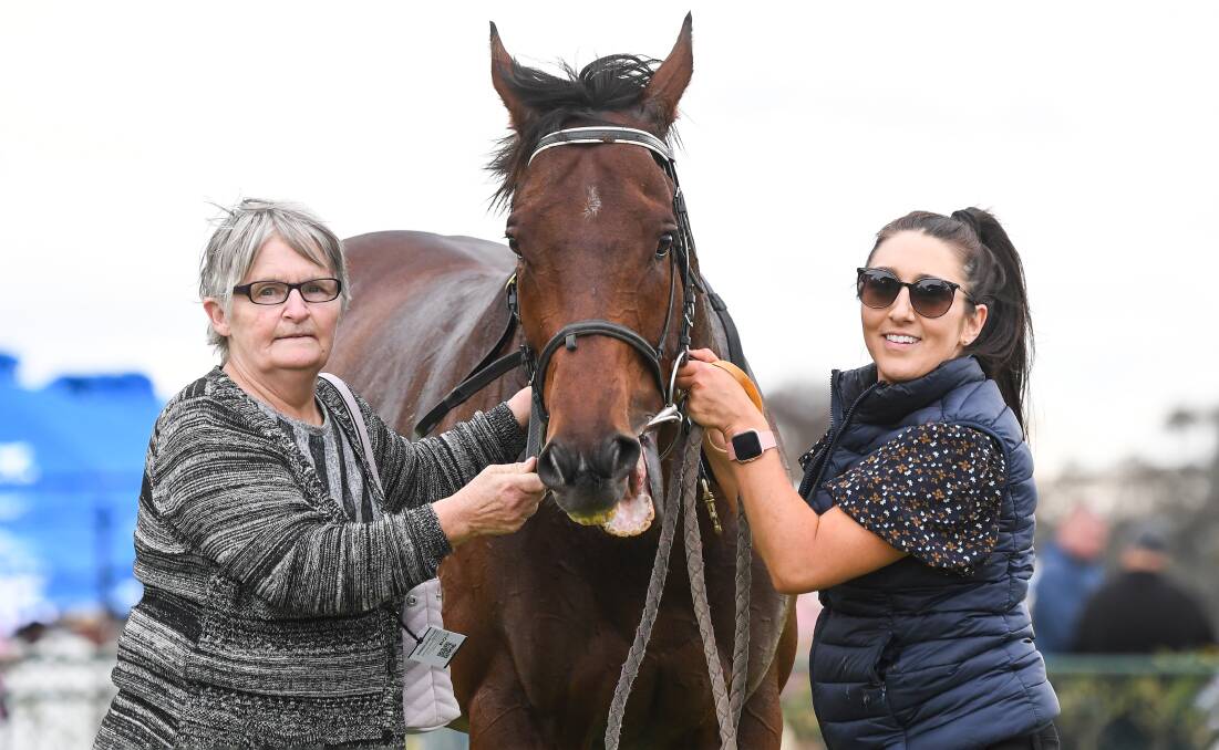 ELATED: Val Browell and Courtney Pace with Colsridge after his victory. Picture: RACING PHOTOS