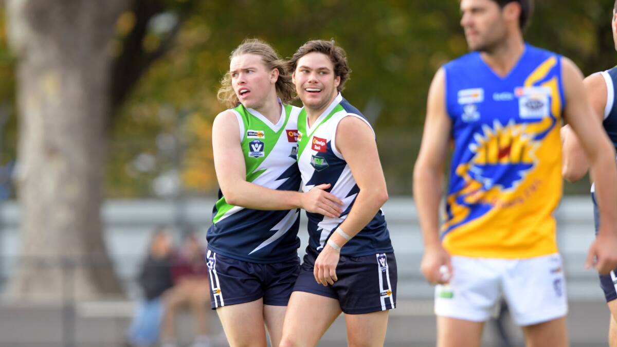 Harry Gadsden and Liam Jacques after a goal in the third term. Picture: GLENN DANIELS