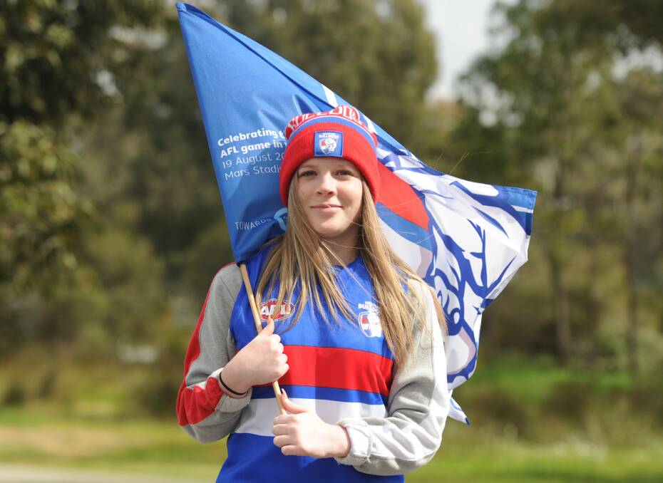 FLYING THE FLAG: Leah Pollard is hoping the Western Bulldogs dominate the Demons in Saturday night's grand final. Picture: ADAM BOURKE