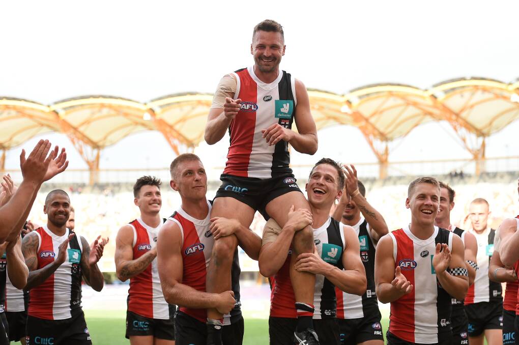 Jarryn Geary is chaired off the ground after the Saints won his 200th AFL game. Picture: GETTY IMAGES