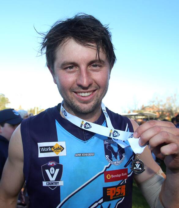 Brodie Collins with the AFL Victoria Medal. Picture: GLENN DANIELS