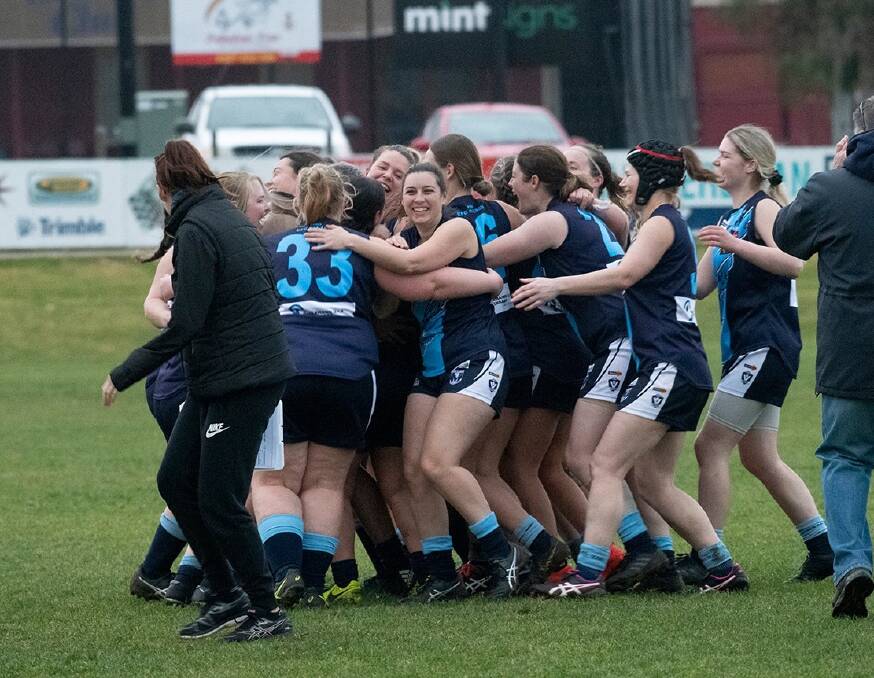 Eaglehawk players celebrate their first win in the CVFLW competition. Picture: NONI HYETT