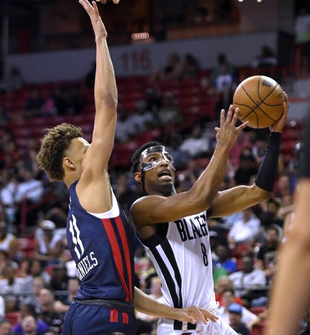 DEFENCE: Dyson Daniels attempts to block a shot in his NBA Summer League debut at the wekend. Picture: AAP
