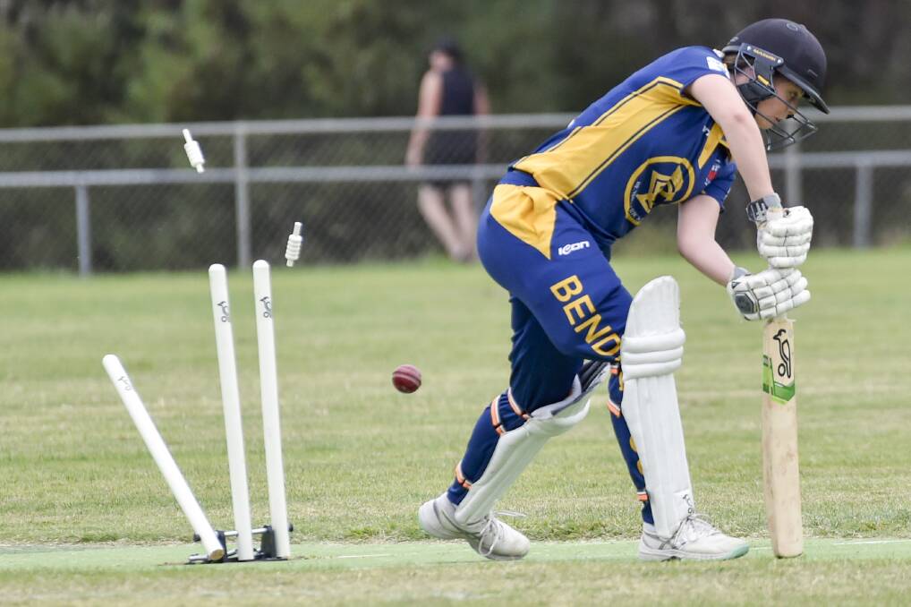 GAME OVER: Bendigo's Amy Ryan is clean bowled in Sunday's semi-final loss to Sandhurst. Picture: DARREN HOWE