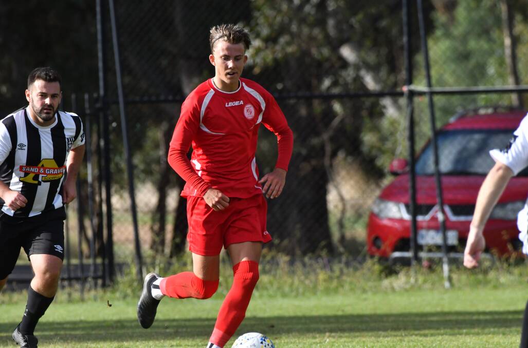 ON THE CHARGE: Spring Gully United's Flynn Hartigan.